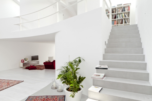 Un loft  inedito ispirato all’architettura organica: uno spazio continuo tra cromie e matericita’